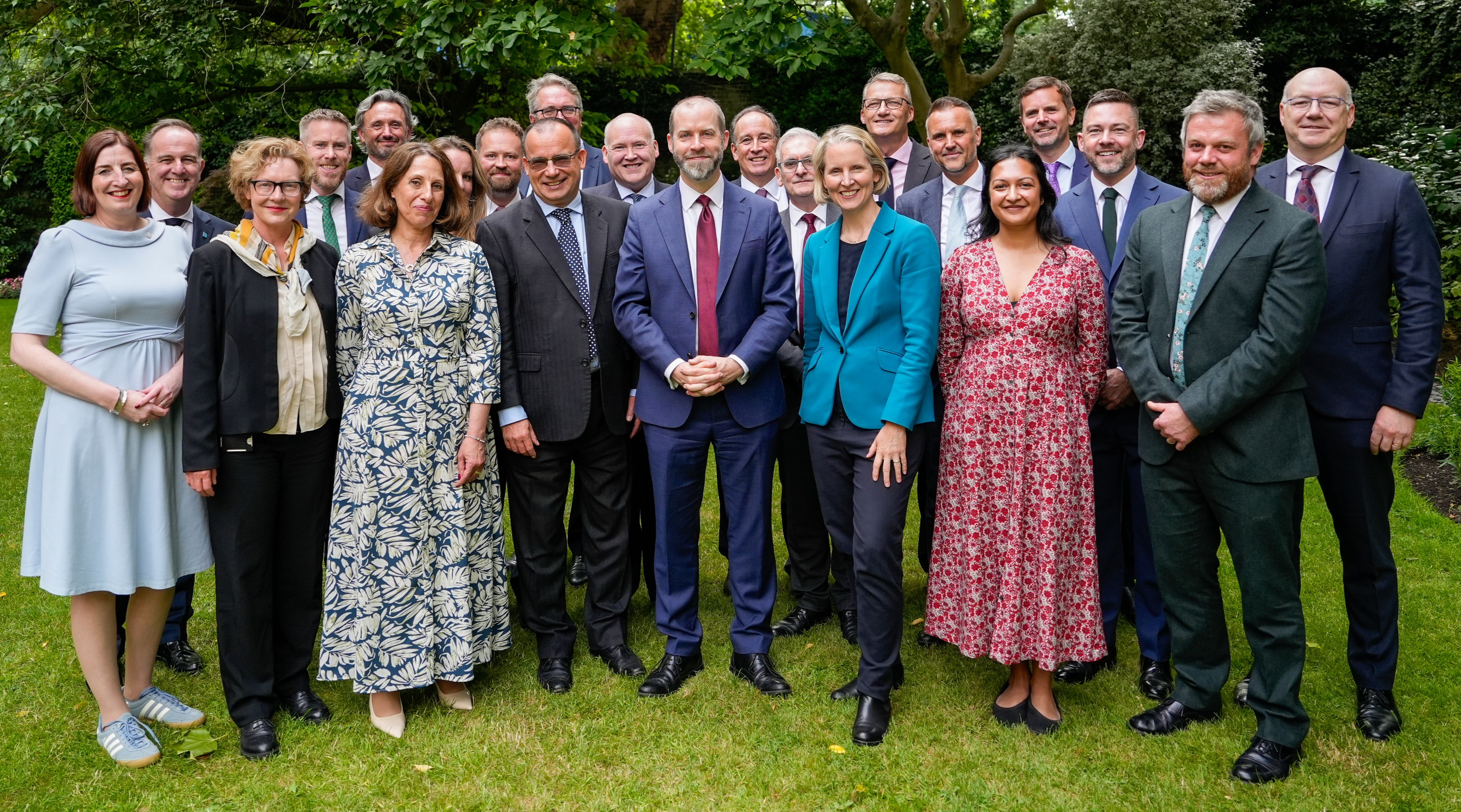 A photograph of leading figures from the co-operative and mutual sectors at a Downing Street reception.