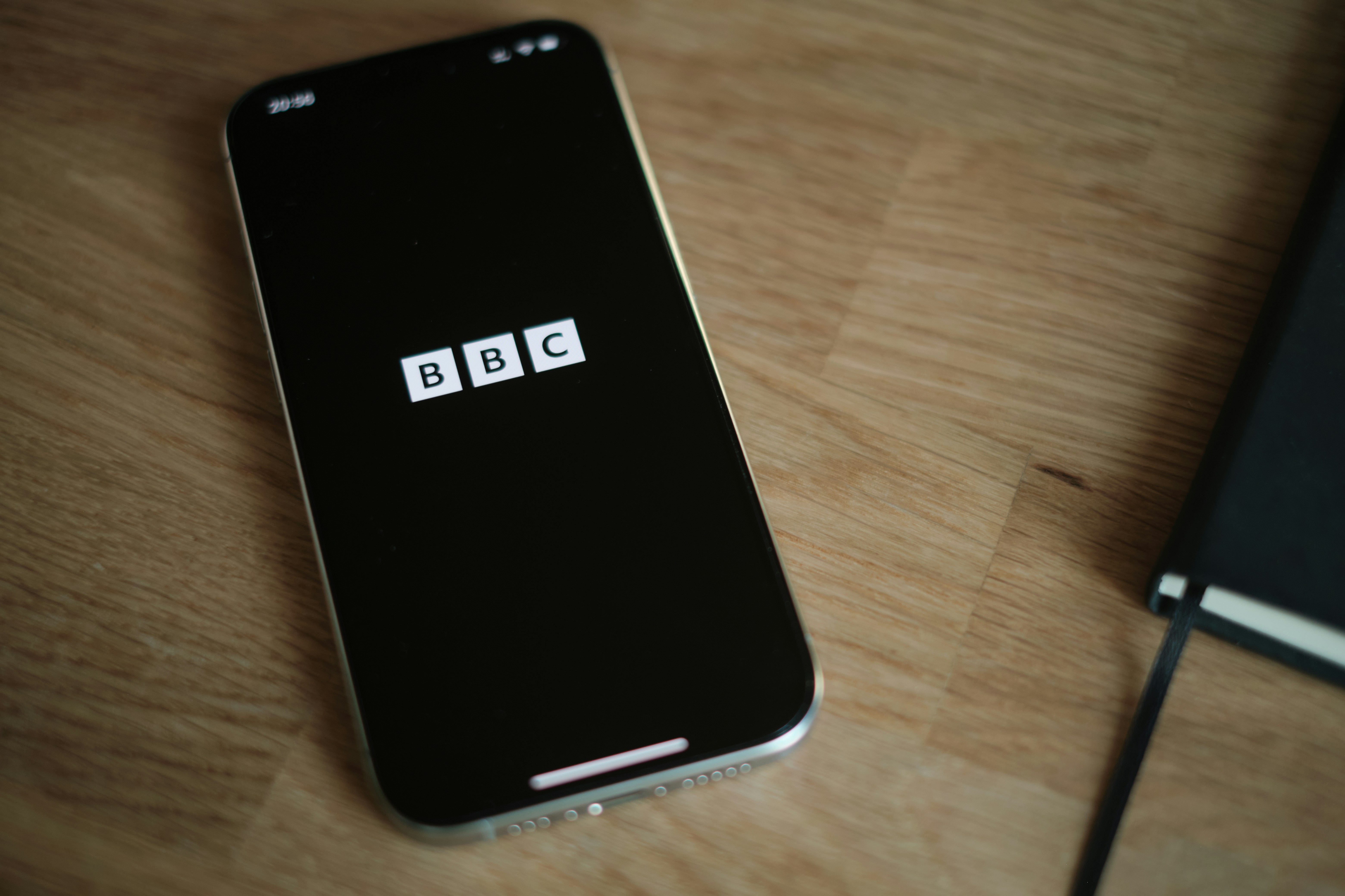 A phone displaying  the BBC logo. Photo by appshunter.io on Unsplash.