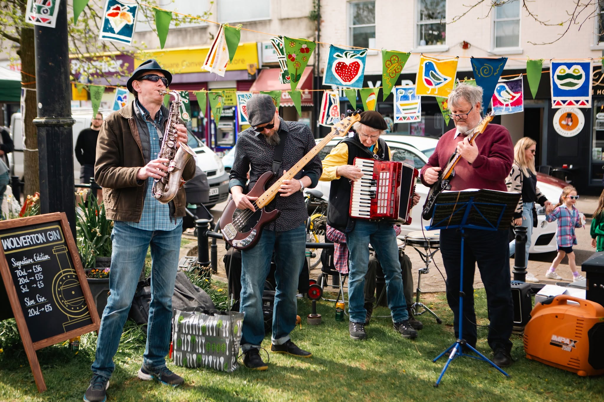 A band playing music at a Wolverton Street market 