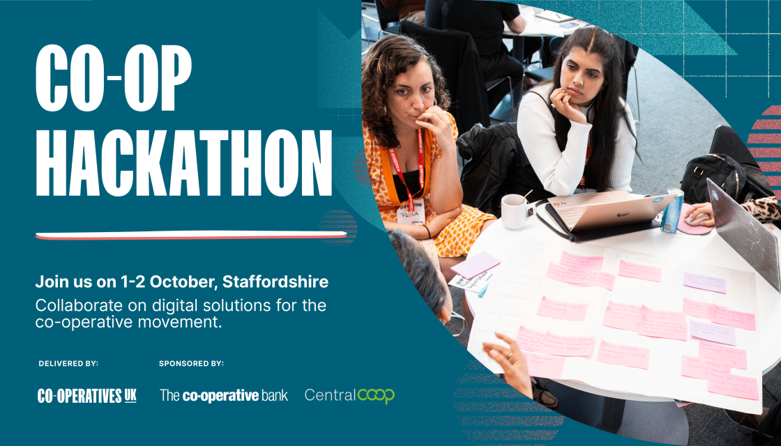 People sat at a table working on an idea at Co-op Hackathon