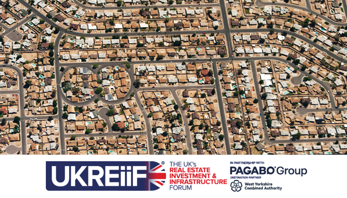 Housing photo featuring the UKREiiF logo