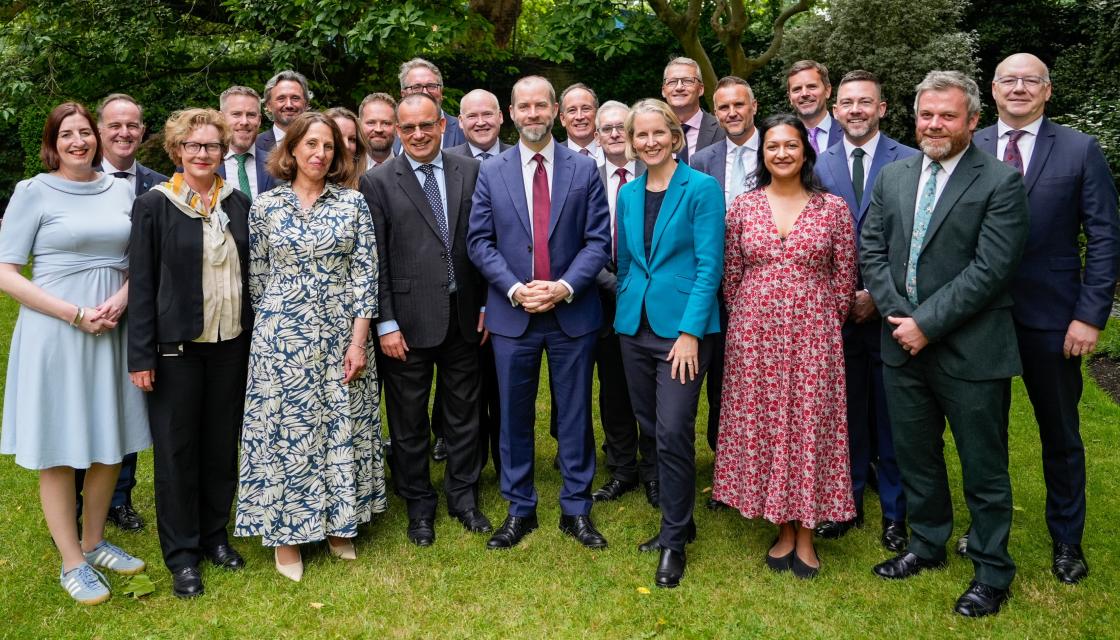 A photograph of leading figures from the co-operative and mutual sectors at a Downing Street reception.