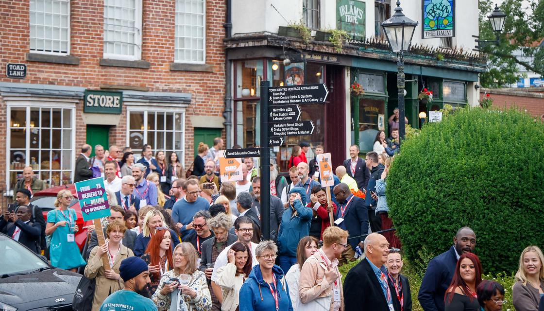people walking a procession in rochdale