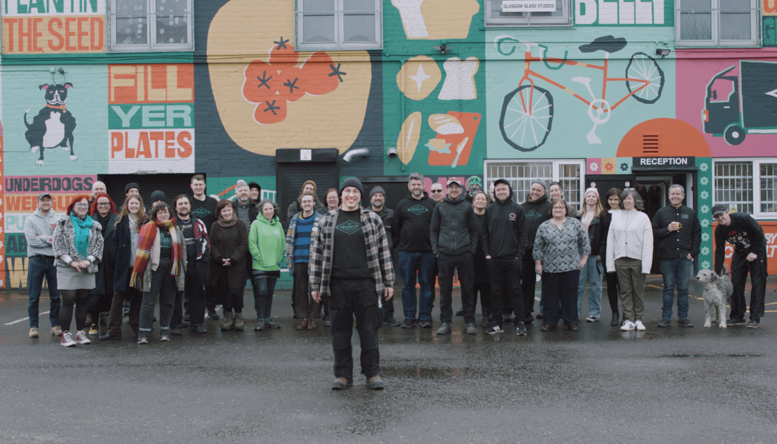 Co-operatives: Owned by our Members | Members of Greencity Wholefoods stood outside their office in Glasgow