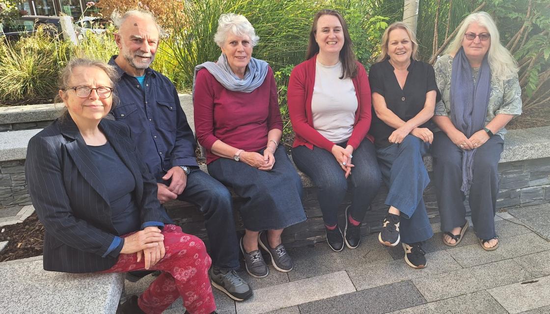 The members of Swop Co-op sat down outside 