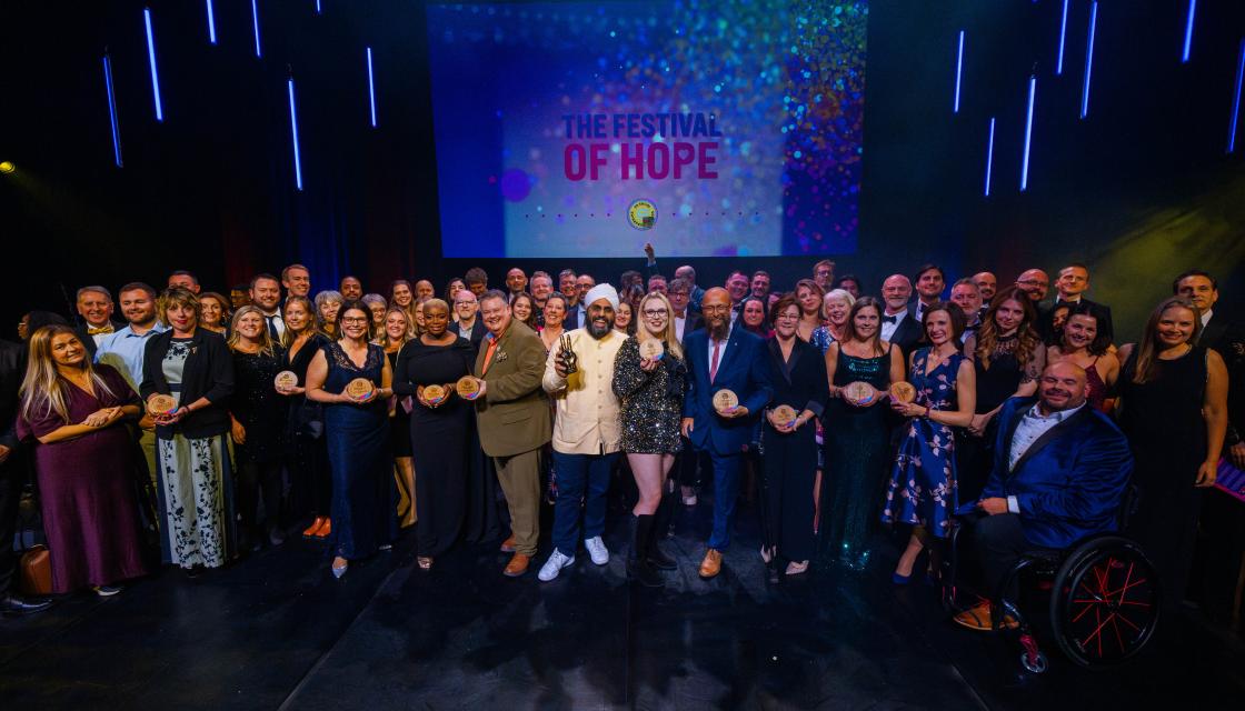 A celebratory group photo of the UK Social Enterprise Awards 2025 winners
