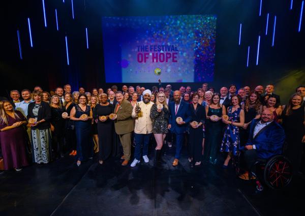 A celebratory group photo of the UK Social Enterprise Awards 2025 winners