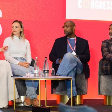 A panel of people on the main stage at Co-op Congress 2024