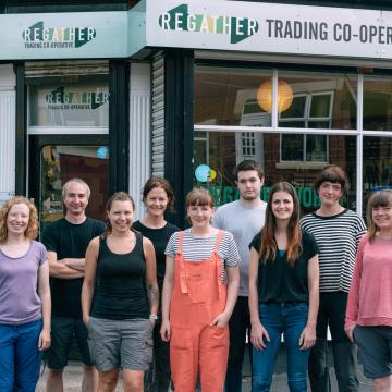 A team of people outside the Regather shop
