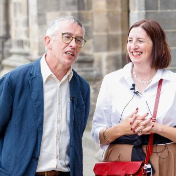 A photograph of Steve Coogan and Rose Marley outside Rochdale Town Hall