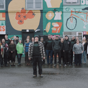 Co-operatives: Owned by our Members | Members of Greencity Wholefoods stood outside their office in Glasgow