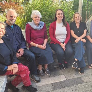 The members of Swop Co-op sat down outside 