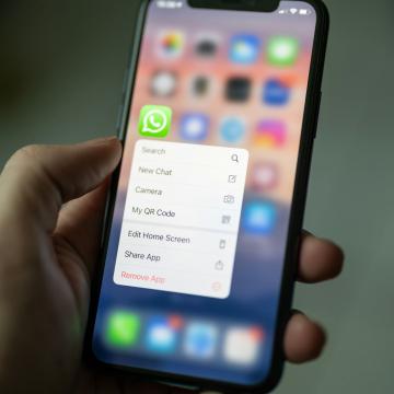 whatsapp app on phone highlighted