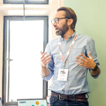 A trainer from Co-operatives UK delivering a training course at an event