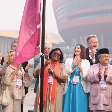 Rose Marley, CEO Co-operatives UK with ICA flag