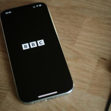 A phone displaying  the BBC logo. Photo by appshunter.io on Unsplash.